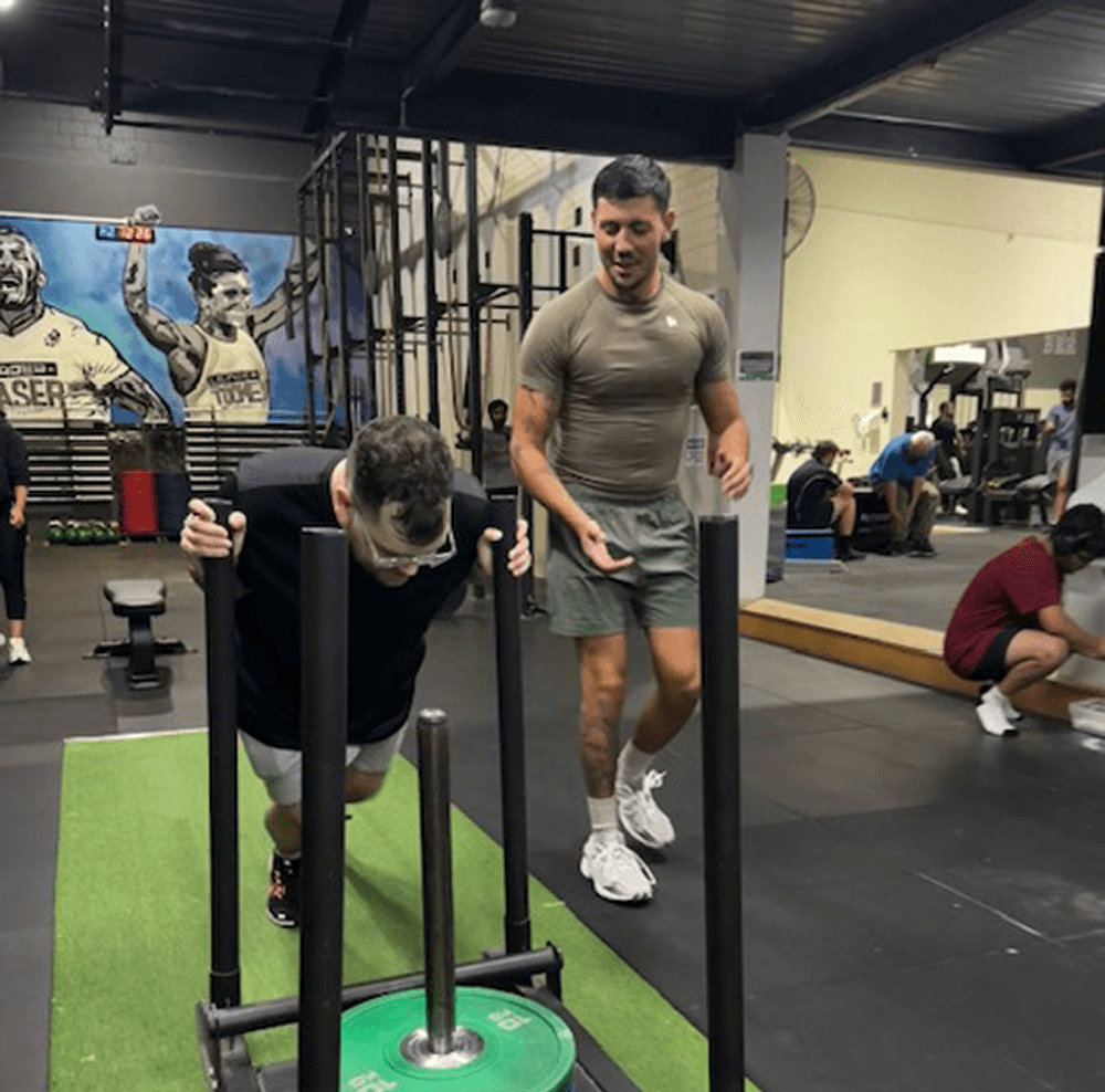 NDIS client Josh with support worker Karim at the gym